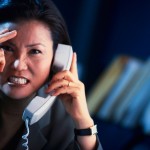 Frustrated Businesswoman on the Phone Frustrated Businesswoman on the Phone